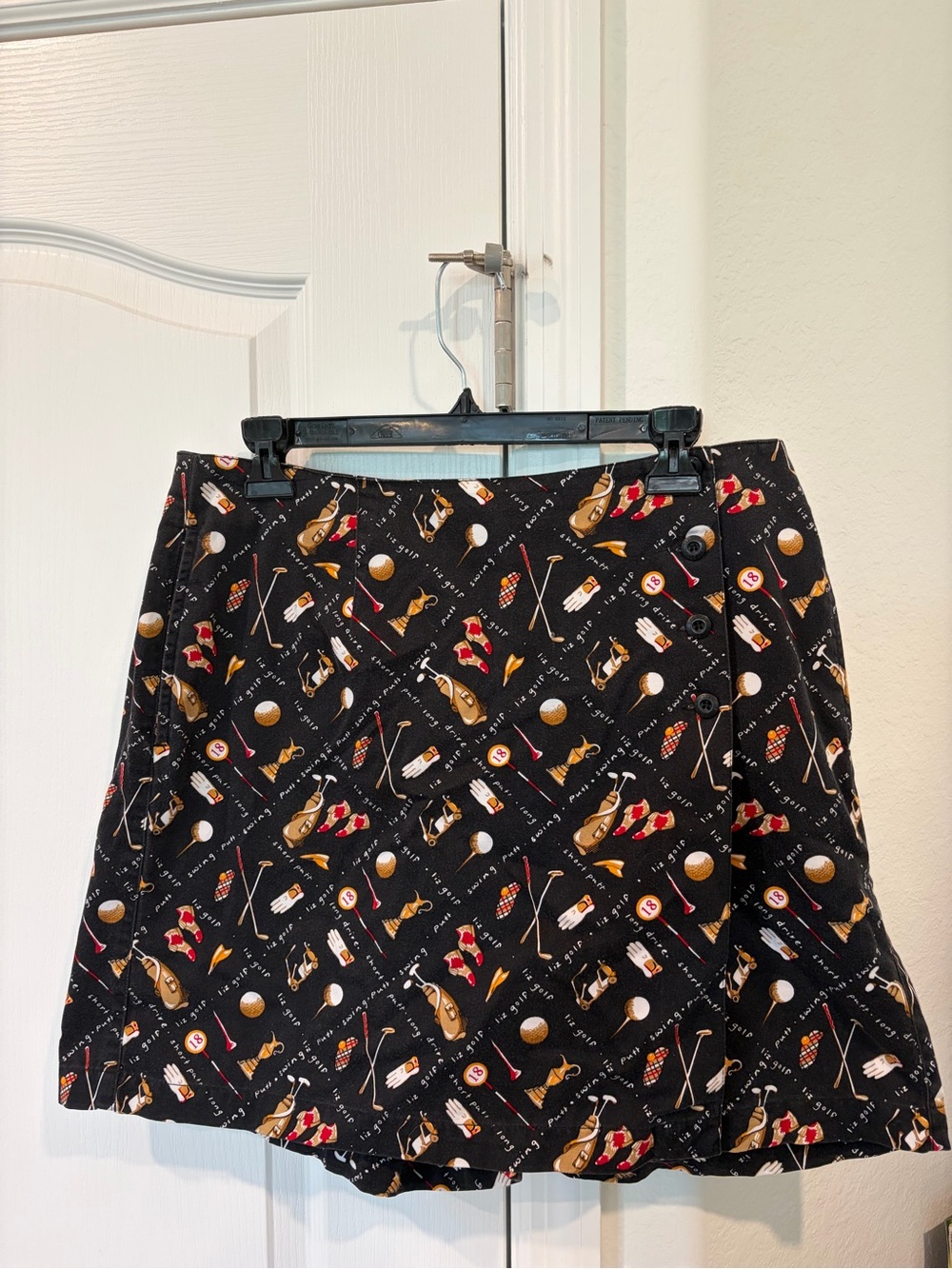 Liz Claiborne Black Golf Motif Mini Skort with Gold and Red Accents